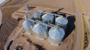 Two Sukup Drag Conveyors in an overhead installation.